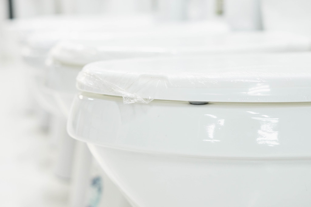 Close-up image of toilet bowls in the shop