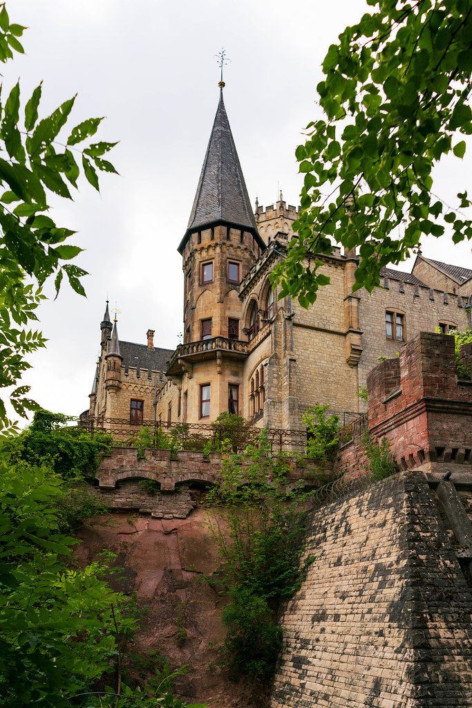 Close up of Marienburg Castle’s tower standing on the cliff