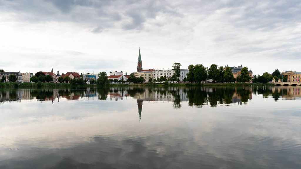 Close up of reflection of Schwerin town and beautiful church in the lake