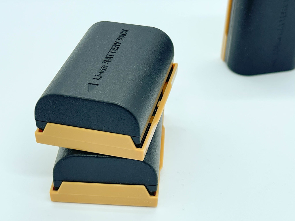 Close-up of two rechargeable Li-ion battery packs on white background