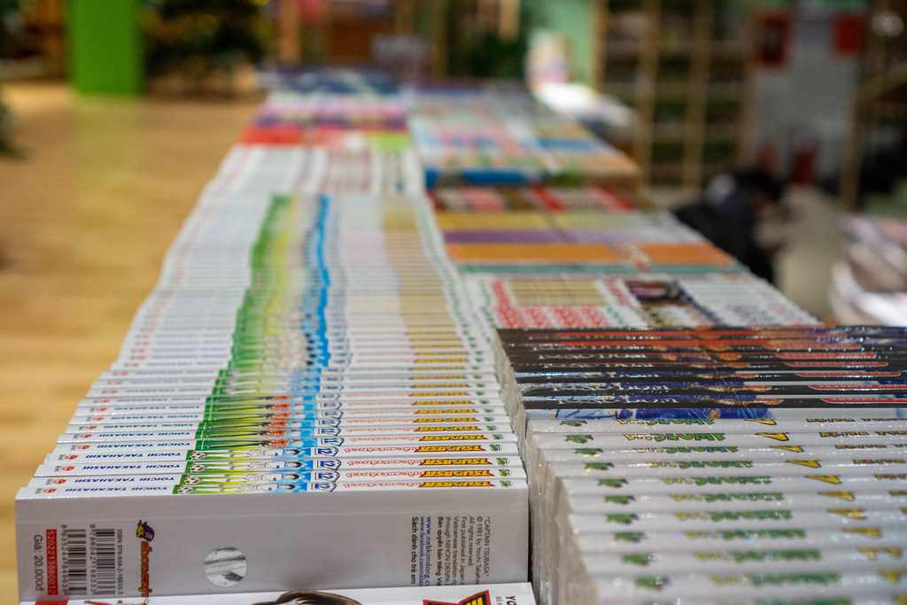 Close Up Photo of Captain Tsubasa Manga Books and other Comics lined up on a Table in a Bookstore