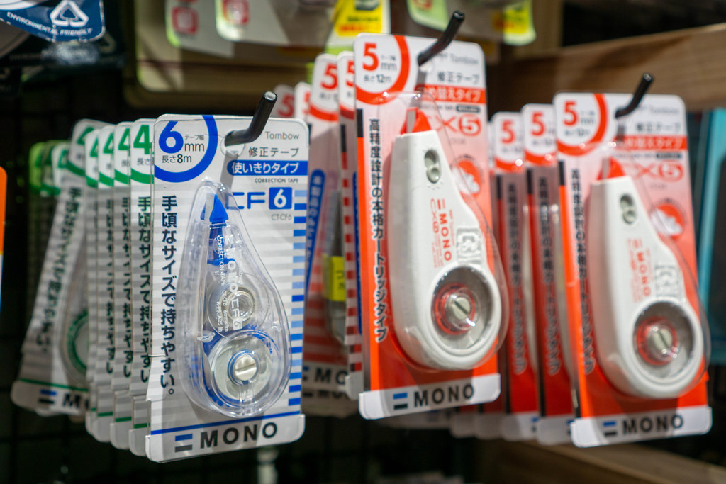 Close Up Photo of Mono Correction Tapes in different Sizes on a Sale Shelf in a Stationery Store