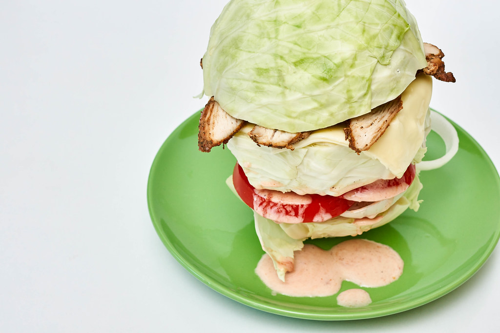 Close-up view of vegetarian hamburger consisting of vegetables