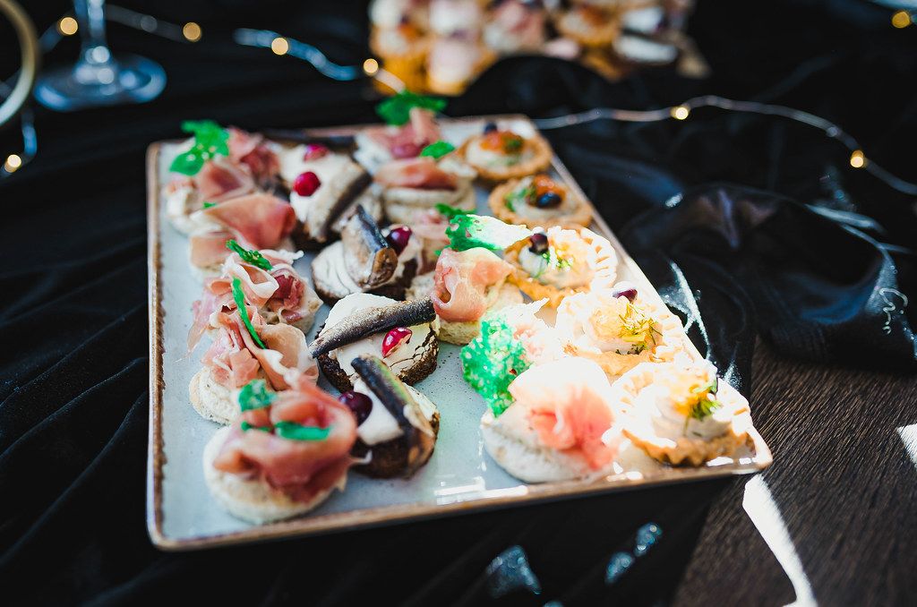 Close Up With Luxury Canapes With Herring And Crea