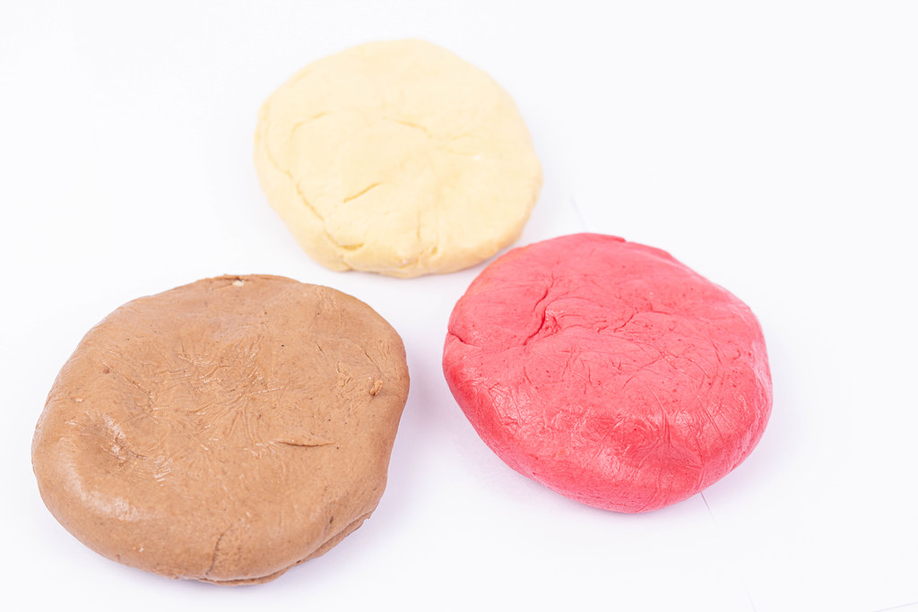 Colored Raw Dough loafs on the white background