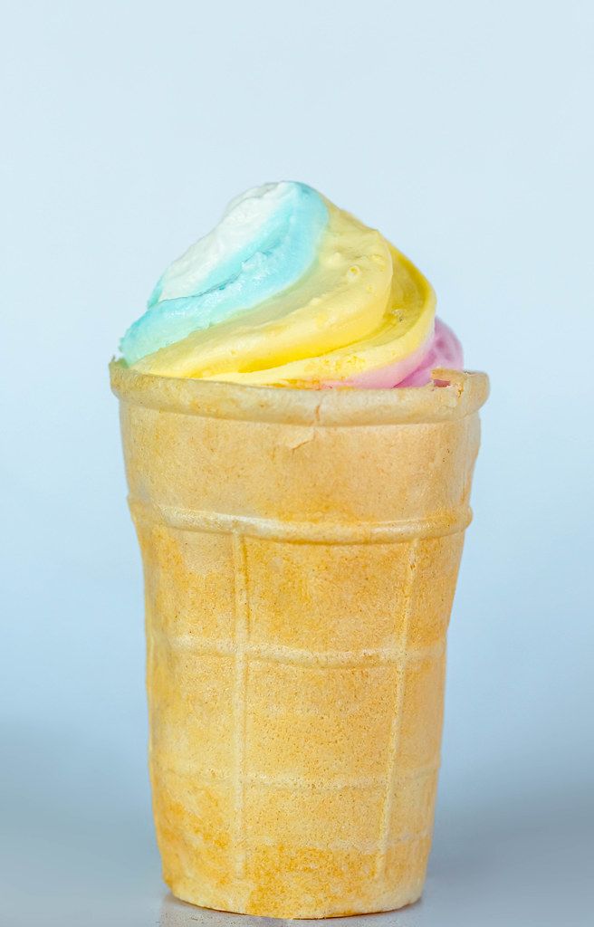 Colorful ice cream in a waffle cup