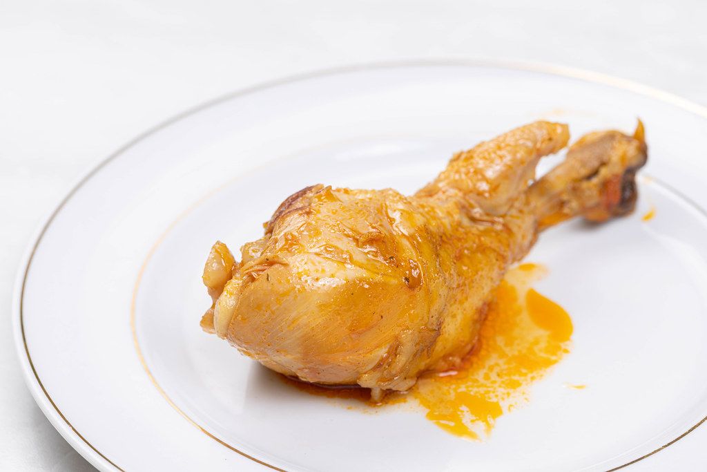 Cooked Chicken Drumstick served on the plate