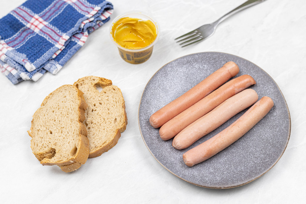 Cooked Frankfurters with Bread and Mustard