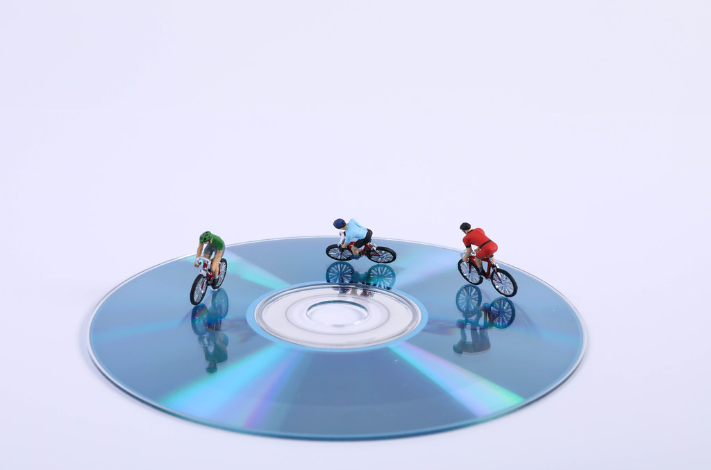 Cyclists on a cd disc