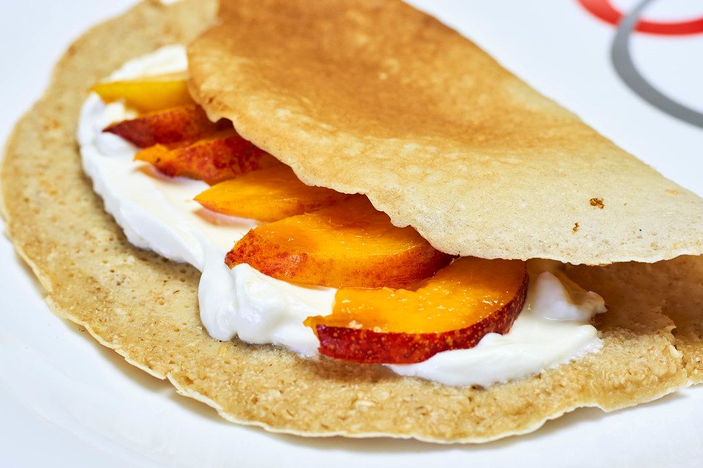 Delicious breakfast for a lazy summer morning. Gluten-free oat-based pancake