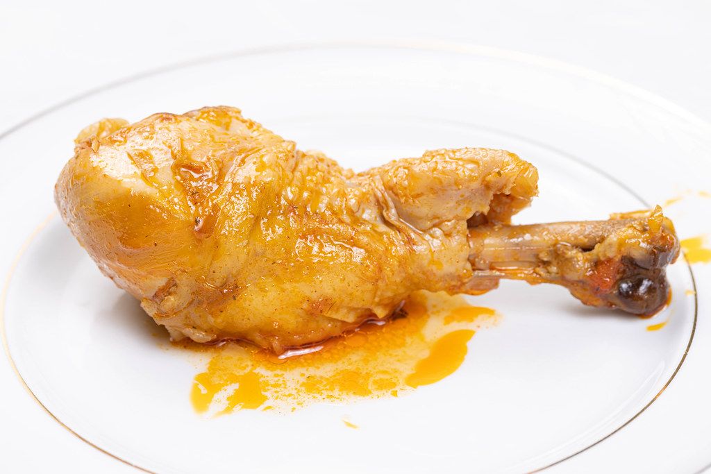 Delicious Cooked Chicken Drumstick on the plate