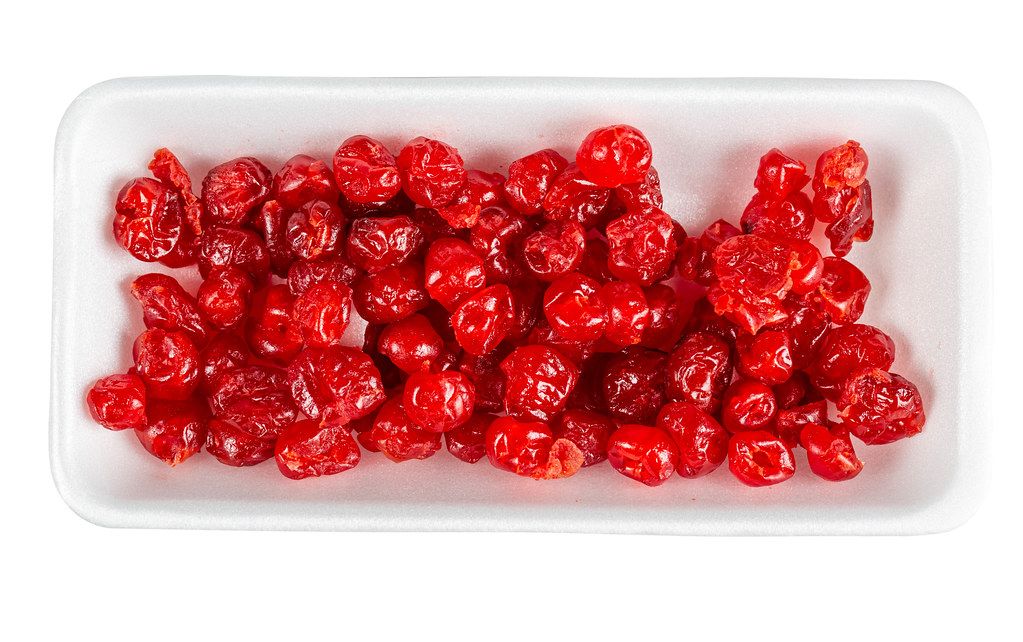 Dried cherries on a white background