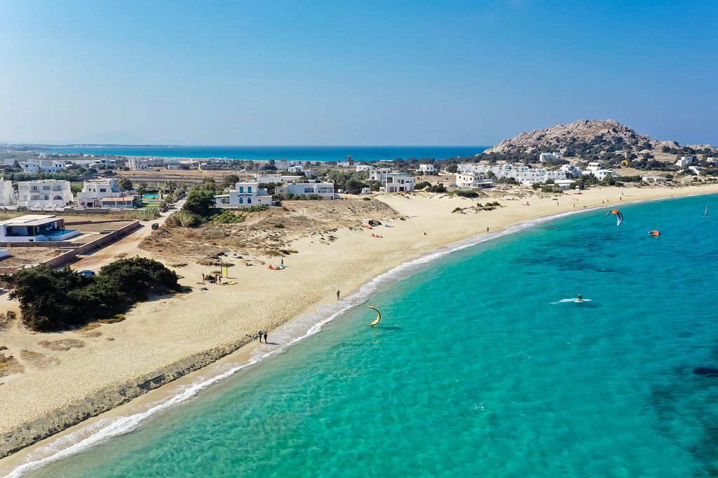 Drone shot of the beach and village of Mikri Vigla on the island Naxos, windsurfing and kite surfing spot