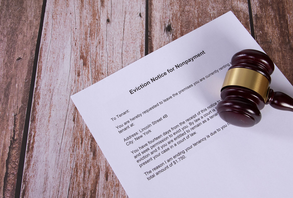 Eviction Notice for Nonpayment document with a wooden judge gavel