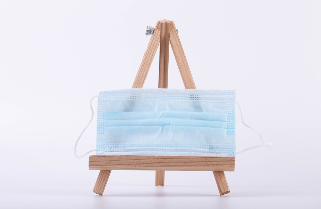 Face mask on a canvas stand