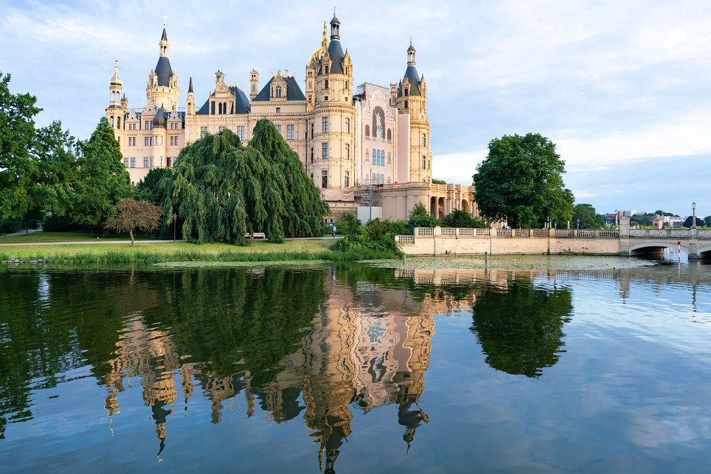 Farytail like picture of beautiful Schwerin castle reflecting in the lake