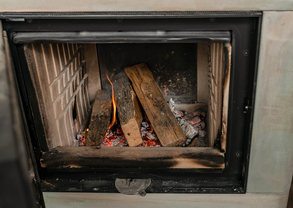 Fireplace With Wood And Flames