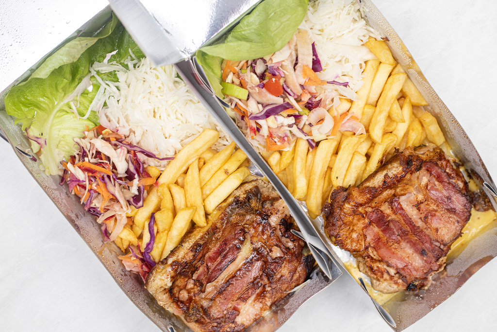 Food Delivery box with fried meat and salad