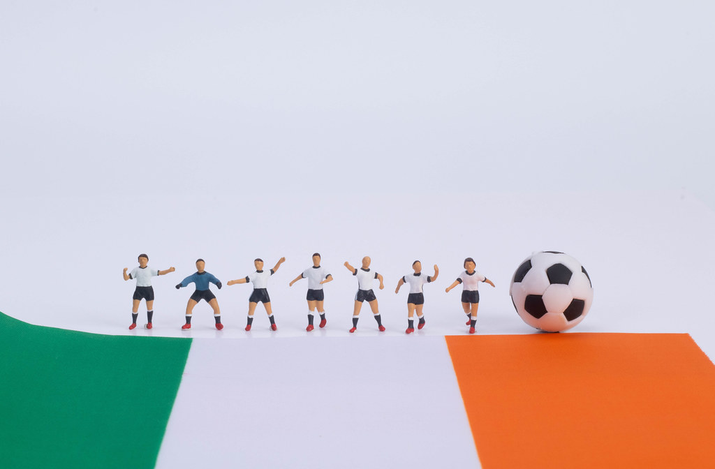 Football players and flag of Ireland