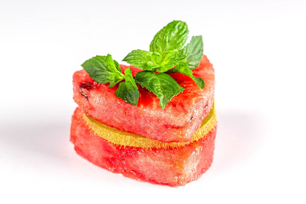 Fruit sandwich with slices of watermelon, kiwi and fresh mint