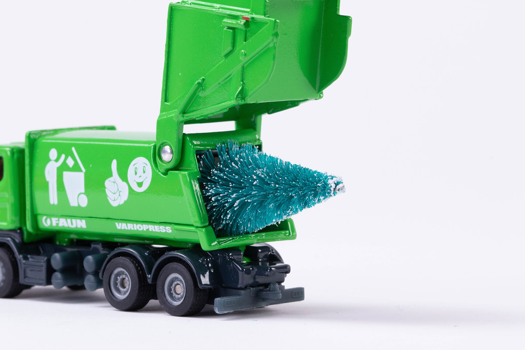 Garbage truck with Christmas tree