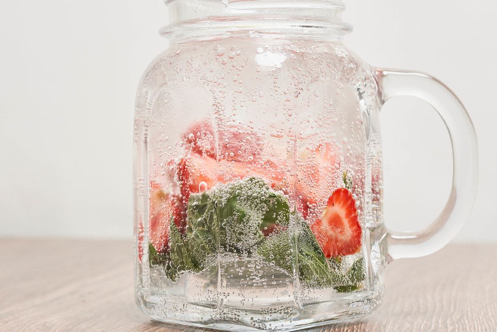 Glass of strawberry soda drink