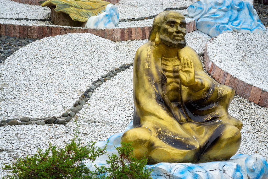 Golden Statue of one of eighteen Arhats of Buddhism at Truc Lam Ho Quoc Zen Monastery on Phu Quoc Island, Vietnam