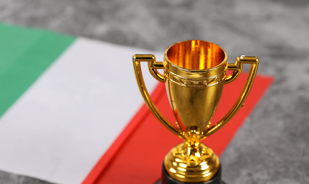 Golden trophy with flag of Italy