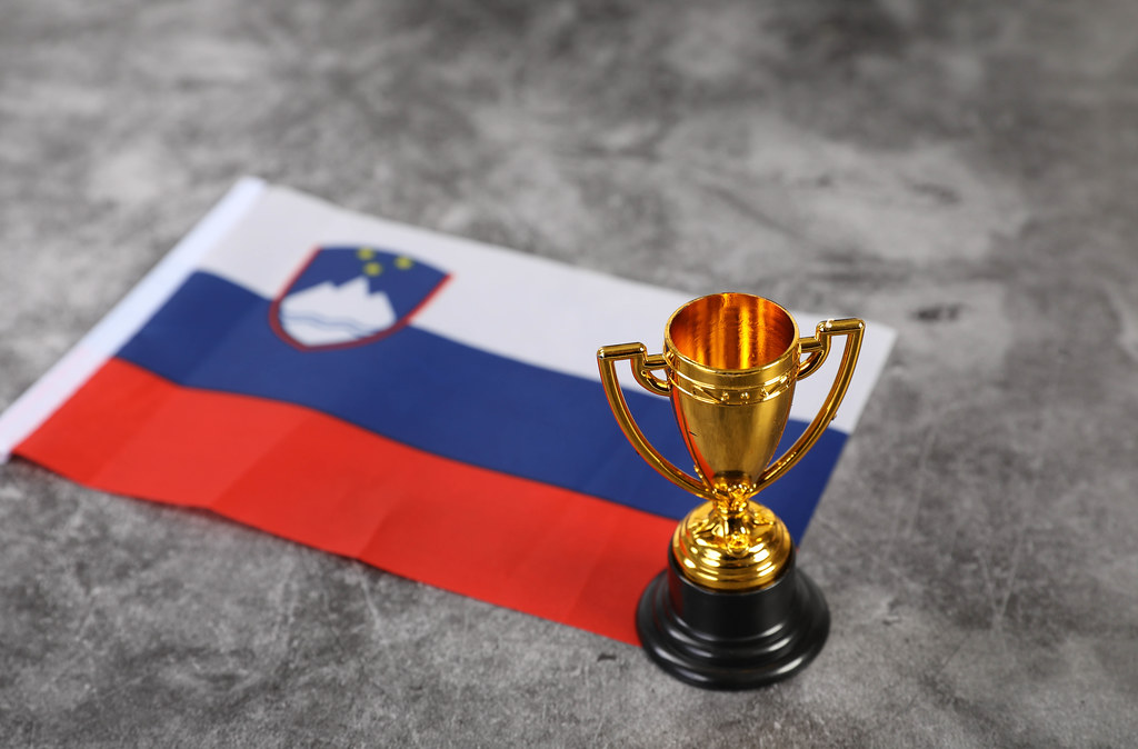 Golden trophy with flag of Slovenia