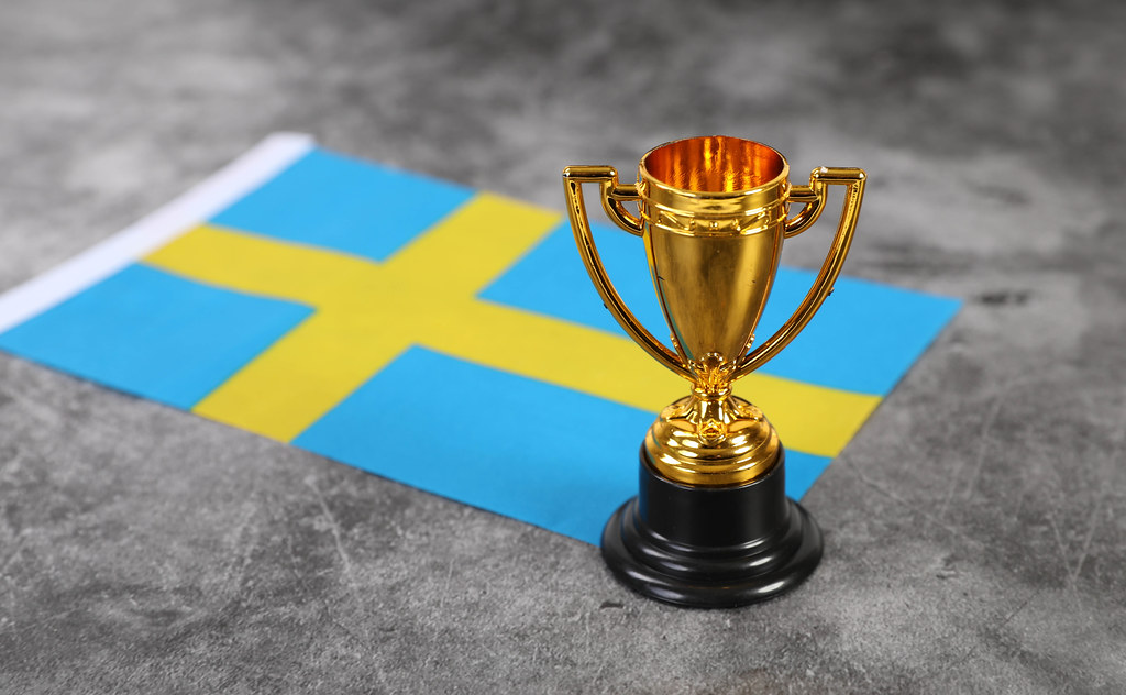 Golden trophy with flag of Sweden