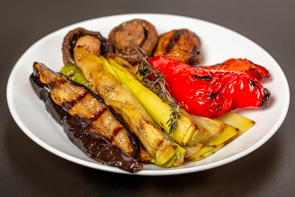 Grilled vegetables on a white plate