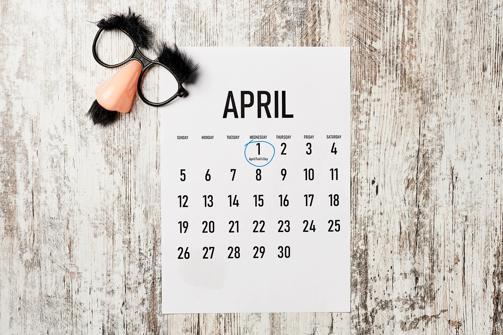 Happy April fools day with calendar and crazy funny mask
