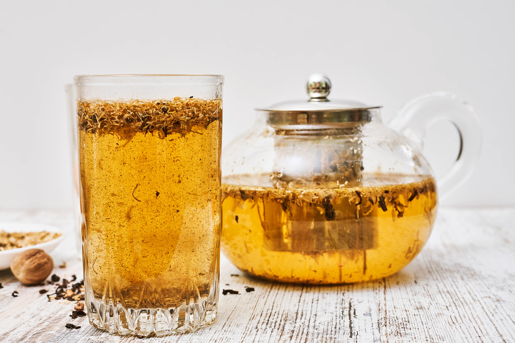 Herbal tea on wooden background