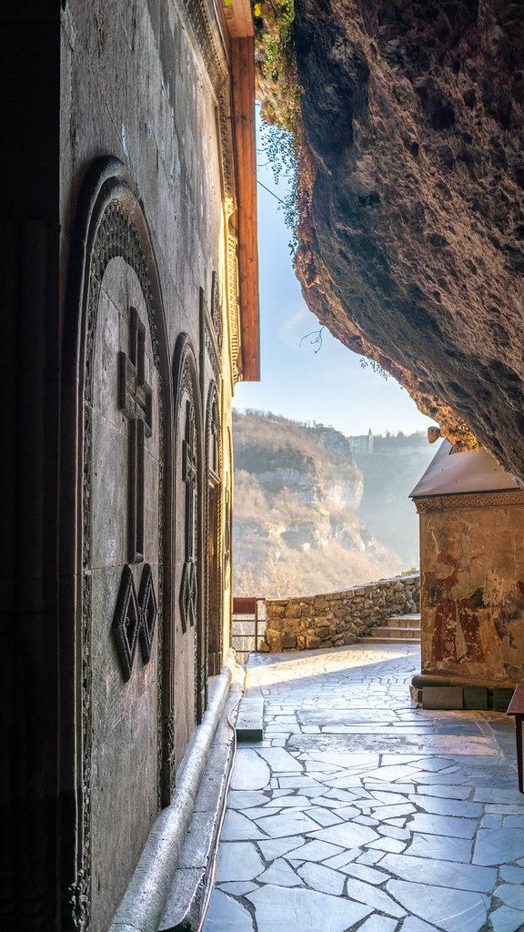 Interior of orthodox Georgian Mghvimevi monastery carved out in cliff