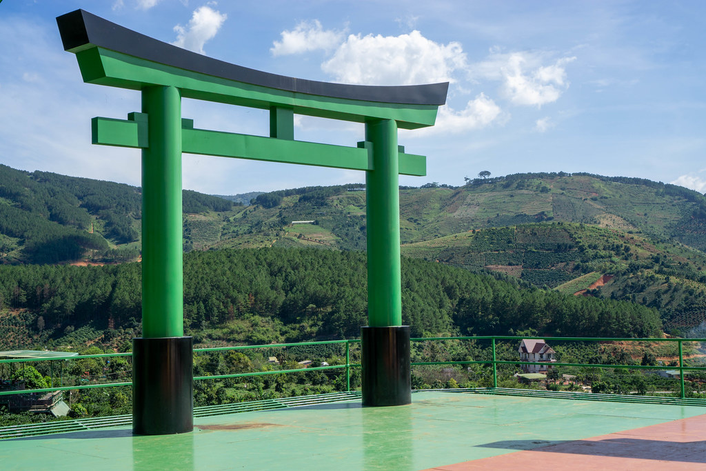 Japanese Hachiman Torii with View of Coffee and Tea Plantations in the Background in Dalat, Vietnam