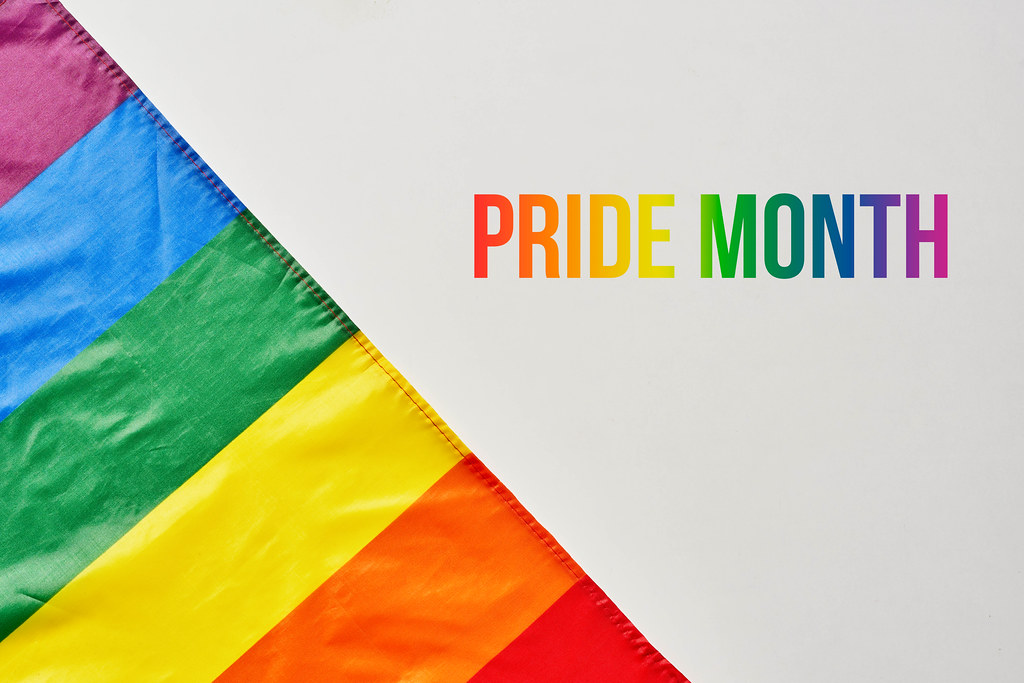 LGBT Pride Rainbow Flag on grey background
