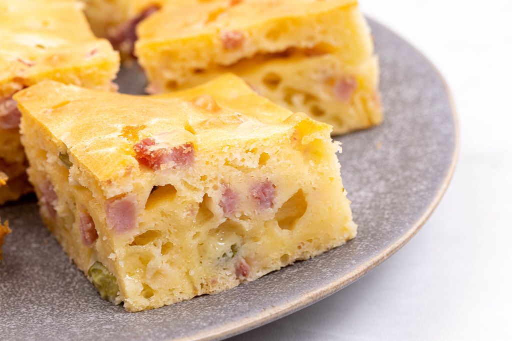 Macro image of Served Pie with Ham Cheese and Pickles