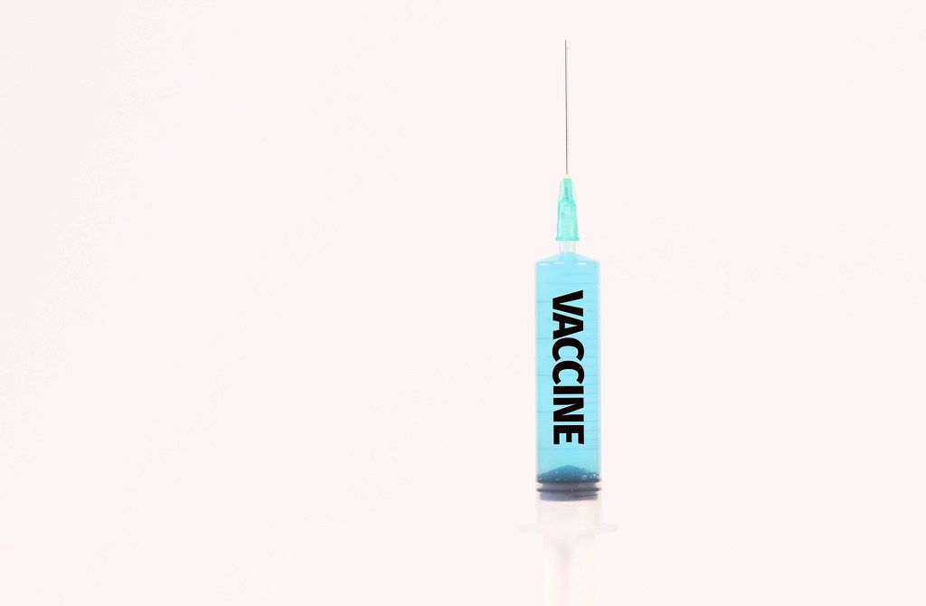 Medical syringe with Vaccine text on it