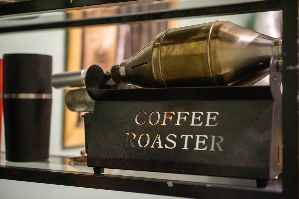Mini Electric Coffee Roaster in a Shelf of a Coffee Shop to Roast Fresh Coffee Beans