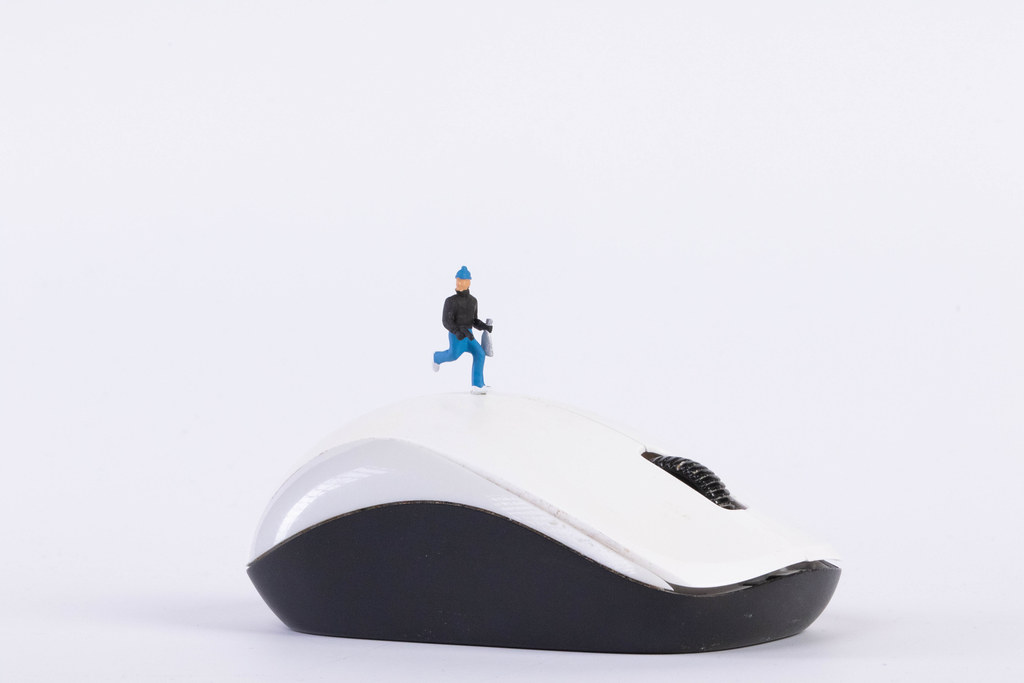 Miniature thief on a computer mouse