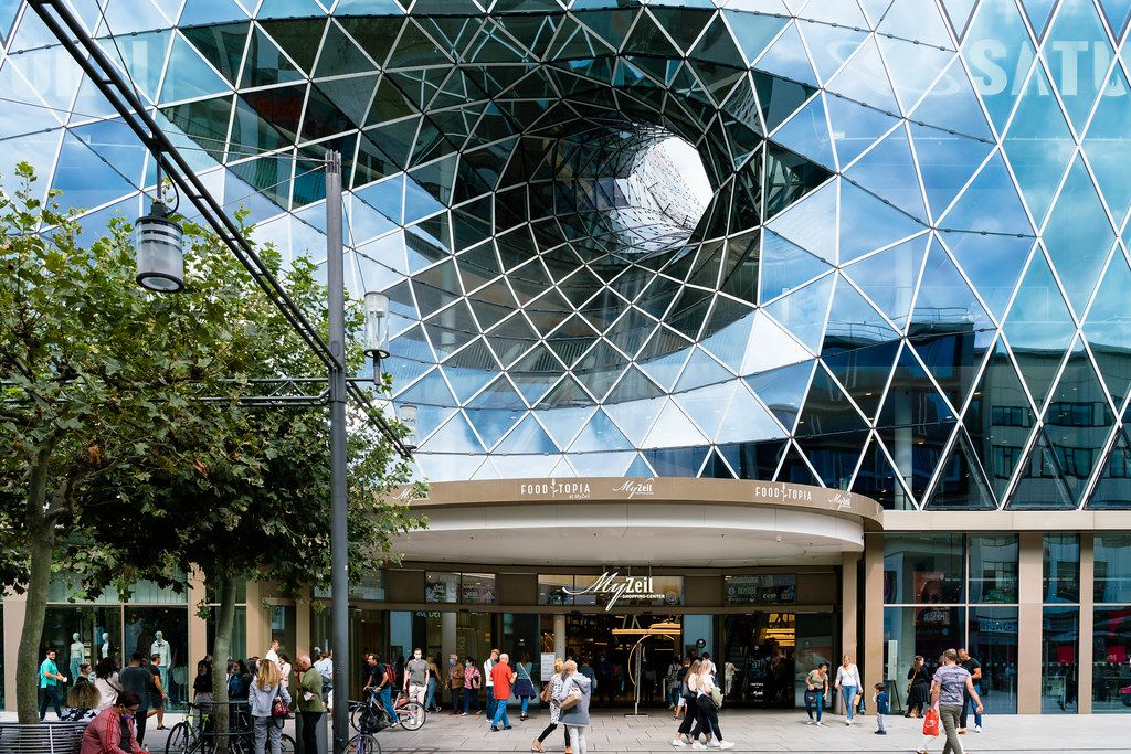 Modern parametric building with a hollow in glass facade of My Zeil mall