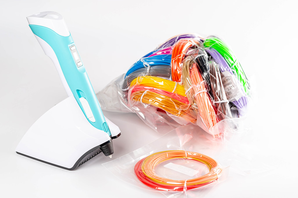 Modern set for children's creativity-3d pen with multi-colored plastic for 3d printing