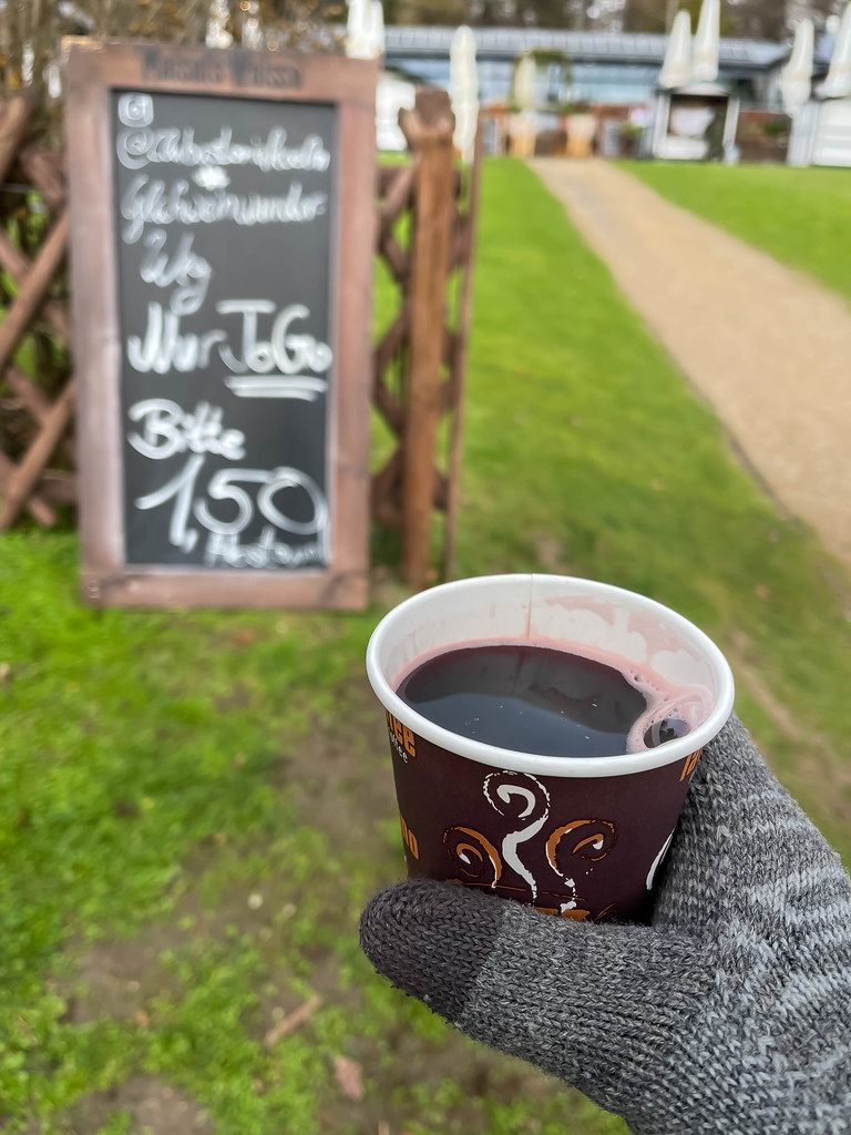 Mulled wine in a paper cup "to go": pre-Christmas time during the Covid pandemic in Germany