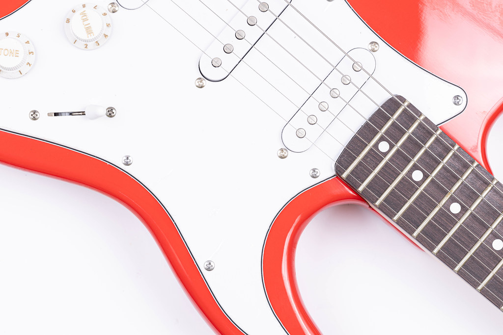 Music concept with Red White electric guitar body