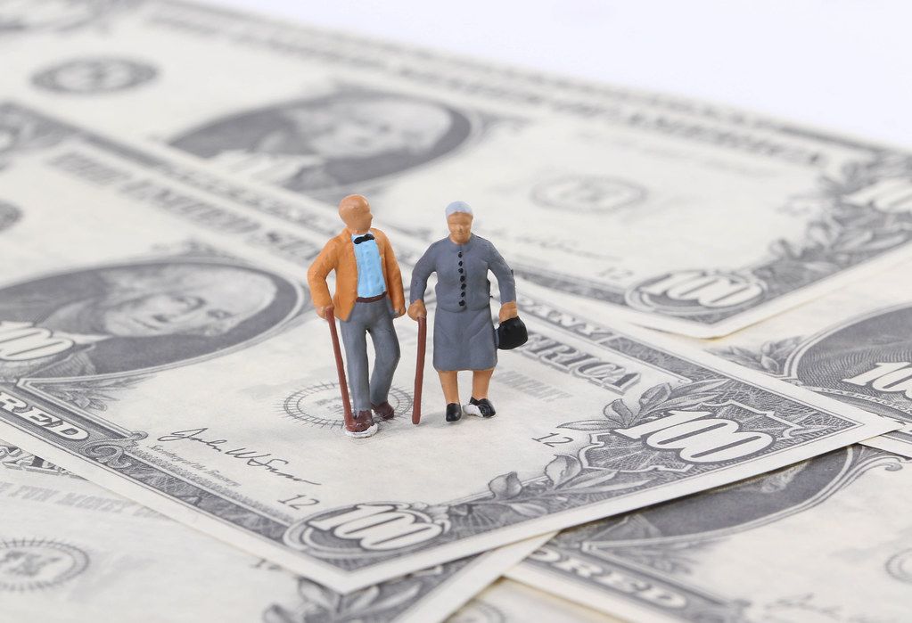 Old couple on dollar banknotes