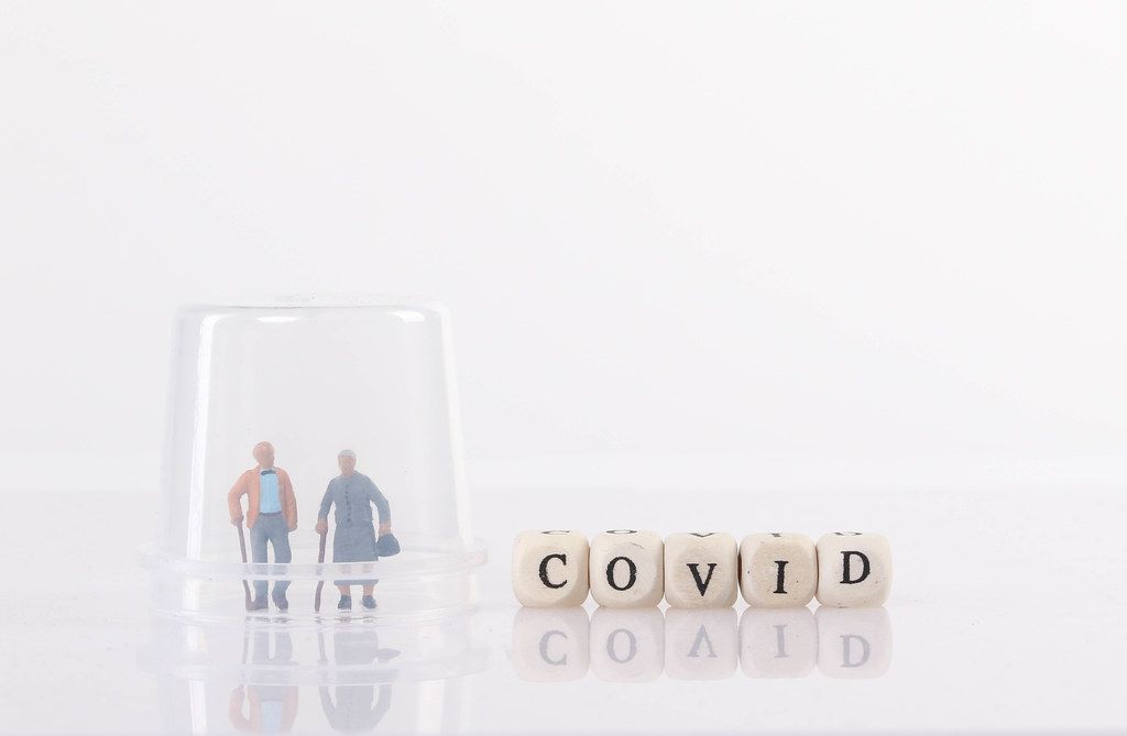 Old couple with Covid text