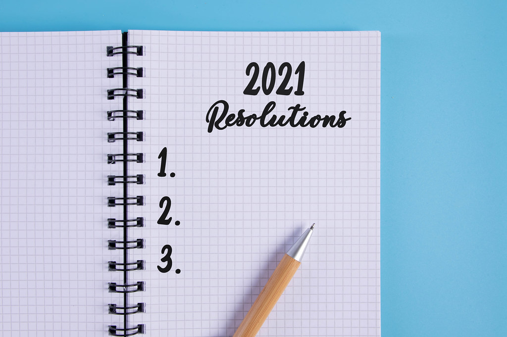 Open notebook with 2021 resolutions list