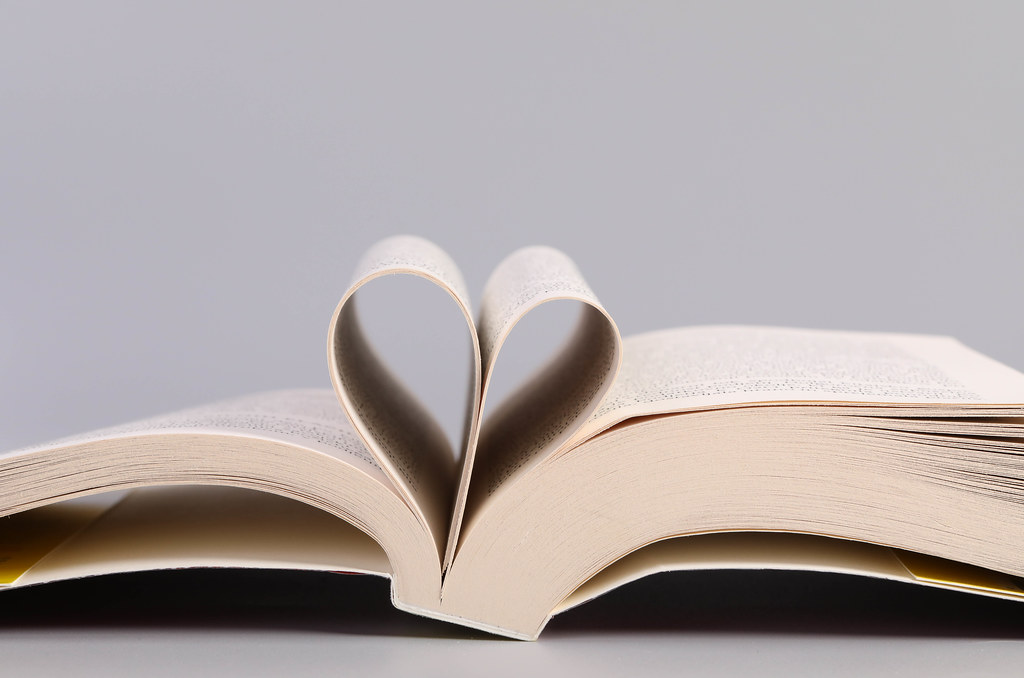 Opened book and heart shape