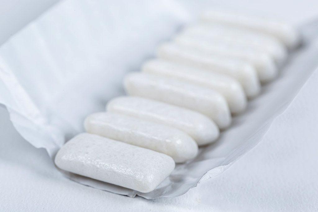 Pieces of white chewing gum