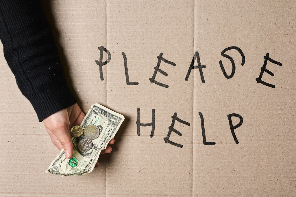 Please help - a beggar begging for money